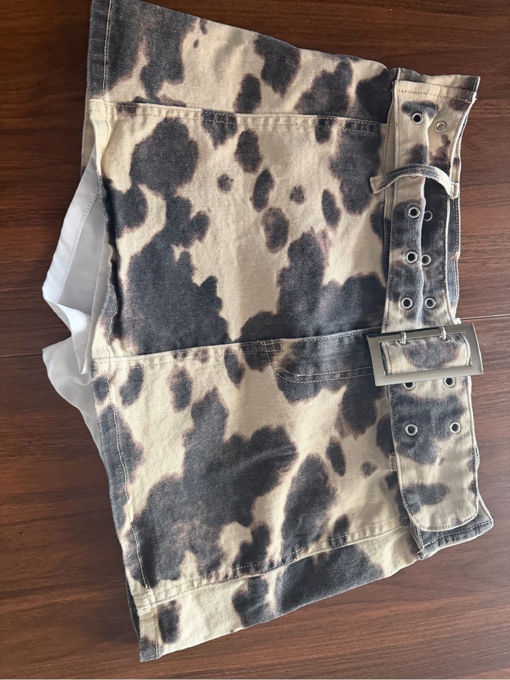 Cow-Print Buckled Mini Skirt in Tan and Black